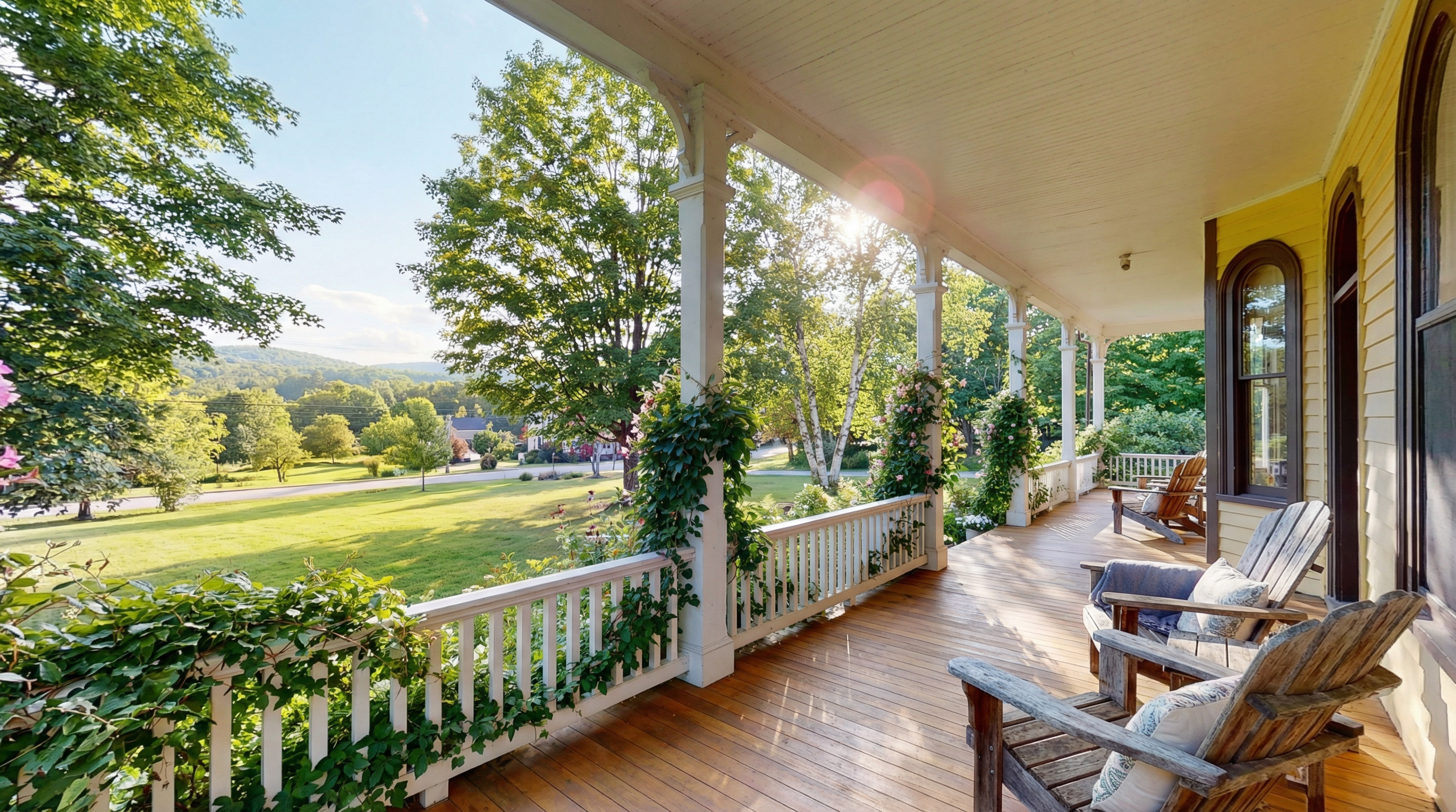 A cozy front porch overlooking Vermont woods in summer